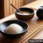 Home 21 일식조리 기능사 필기시험 대비 스터디 가이드 - A detailed, high-resolution image of a traditional Japanese kitchen workspace showcasing key culinar...